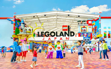 Legoland Japan entrance with families and Lego figures.