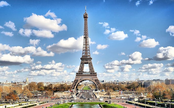 Eiffel Tower in Paris on a sunny day, viewed from Trocadéro Gardens.