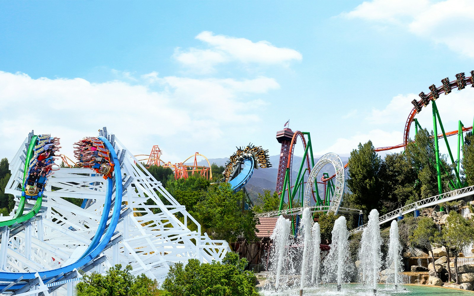Roller coasters and fountains at Six Flags Magic Mountain, California.
