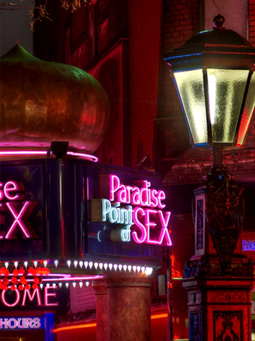 Neon signs and street lamp on Reeperbahn, St. Pauli, Hamburg.