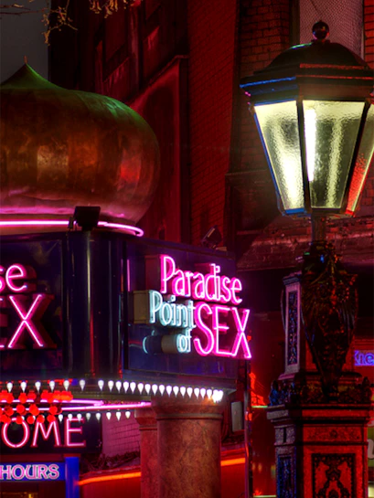 Neon signs and street lamp on Reeperbahn, St. Pauli, Hamburg.