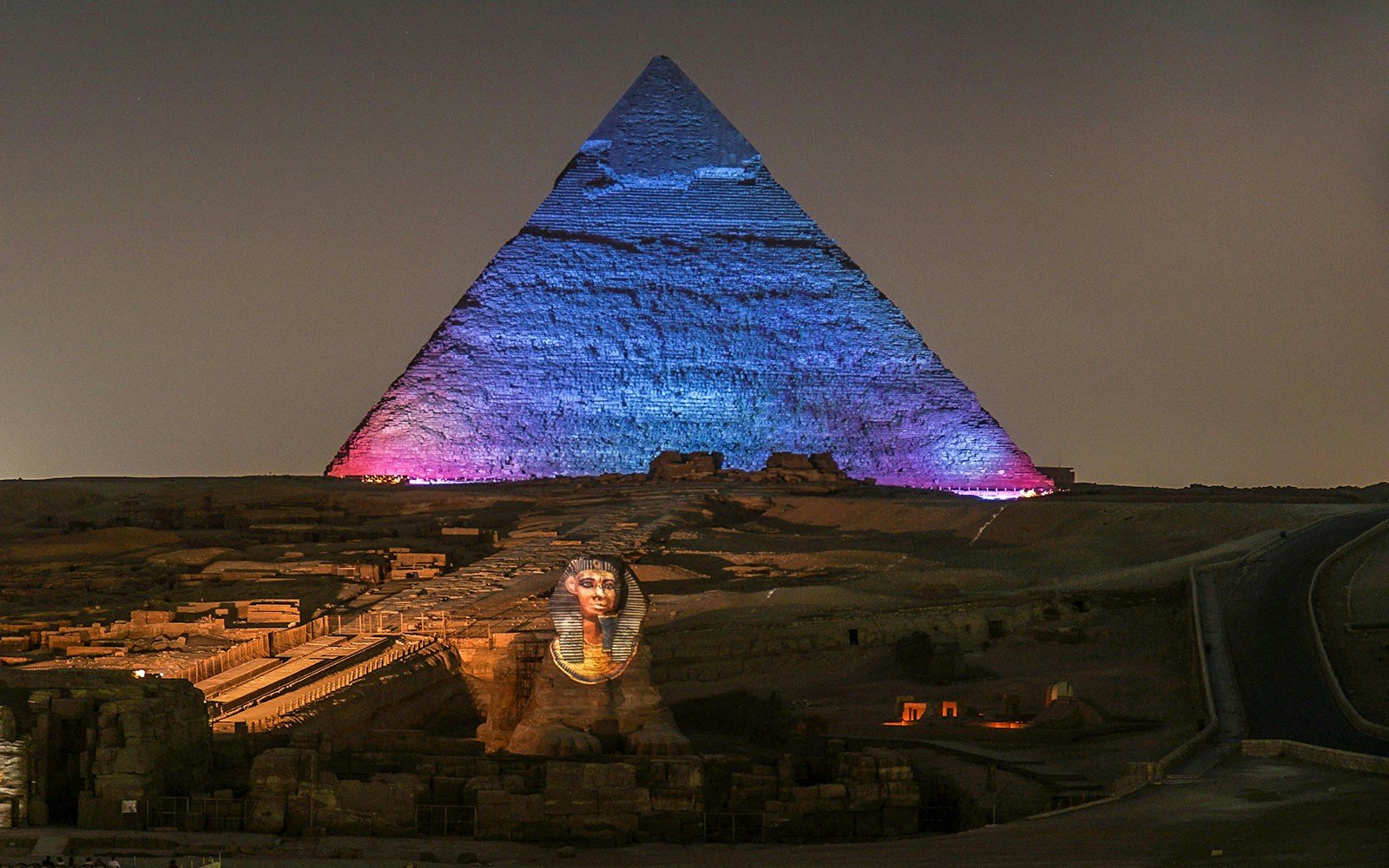 Great Pyramids of Giza illuminated during Sound and Light show, Egypt.