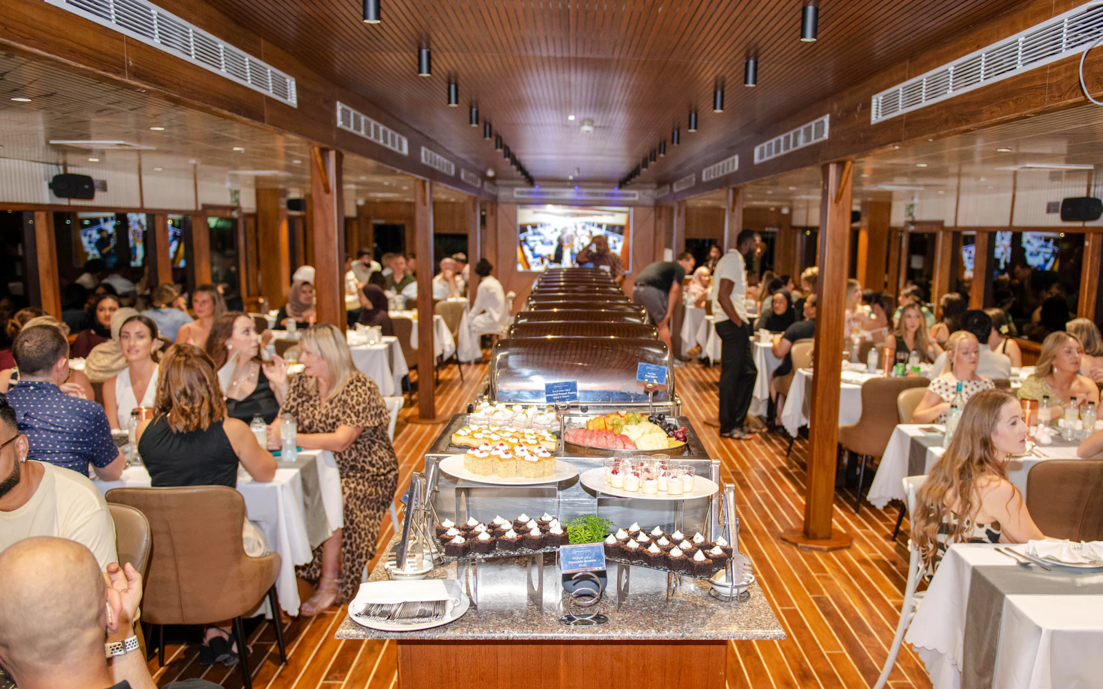 Dubai Marina Dinner Cruise with International Buffet and Live Entertainment Image 7
