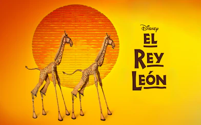 Giraffe puppets from The Lion King musical in front of a stylized sun.