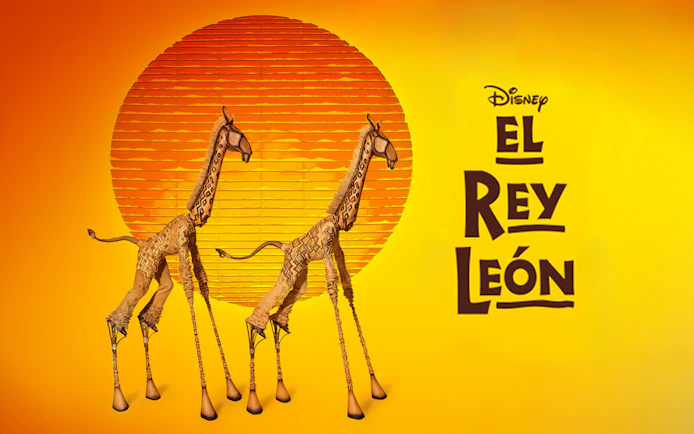 Giraffe puppets from The Lion King musical in front of a stylized sun.