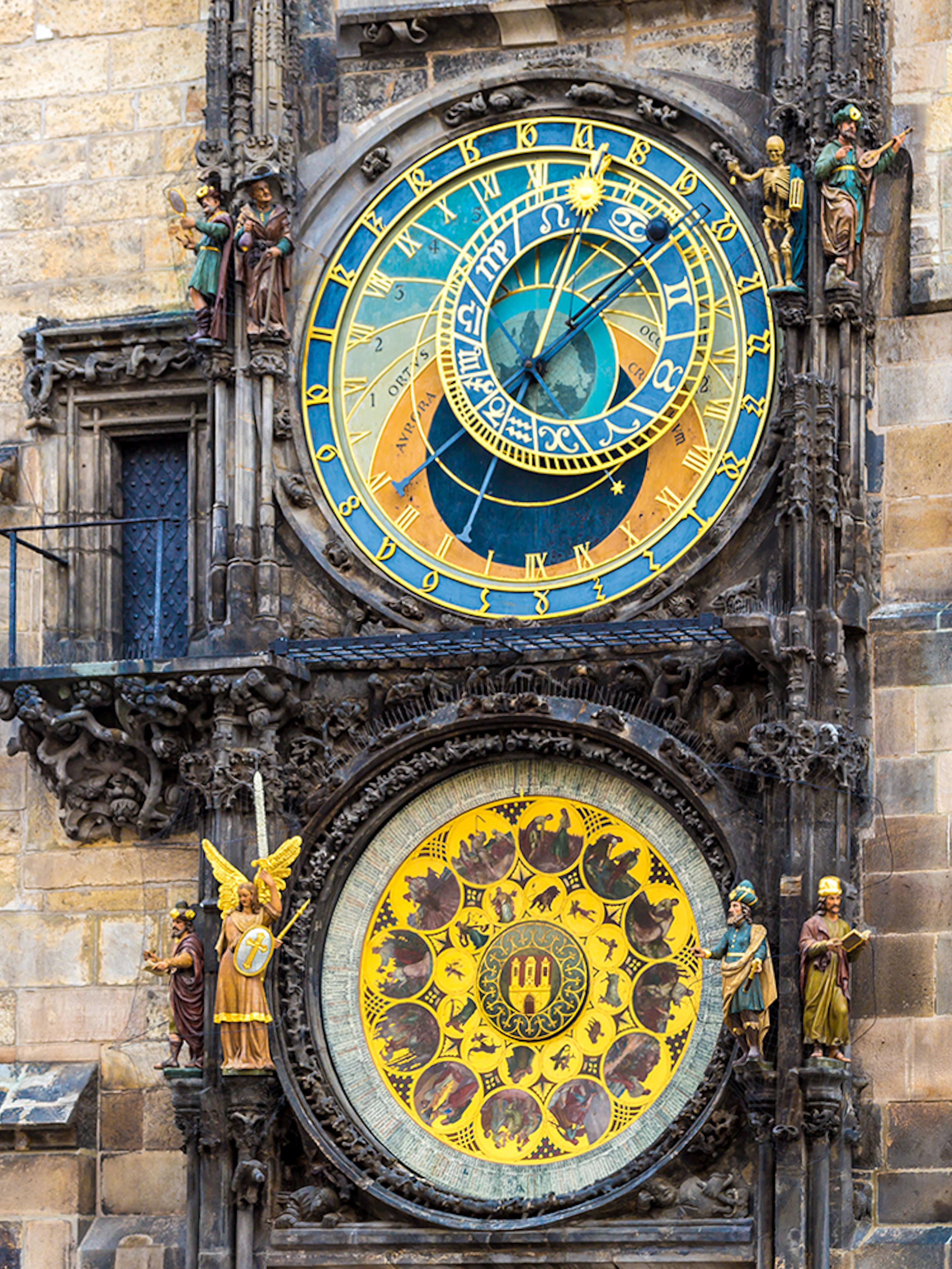 Astronomical Clock in Prague with intricate zodiac and time dials.