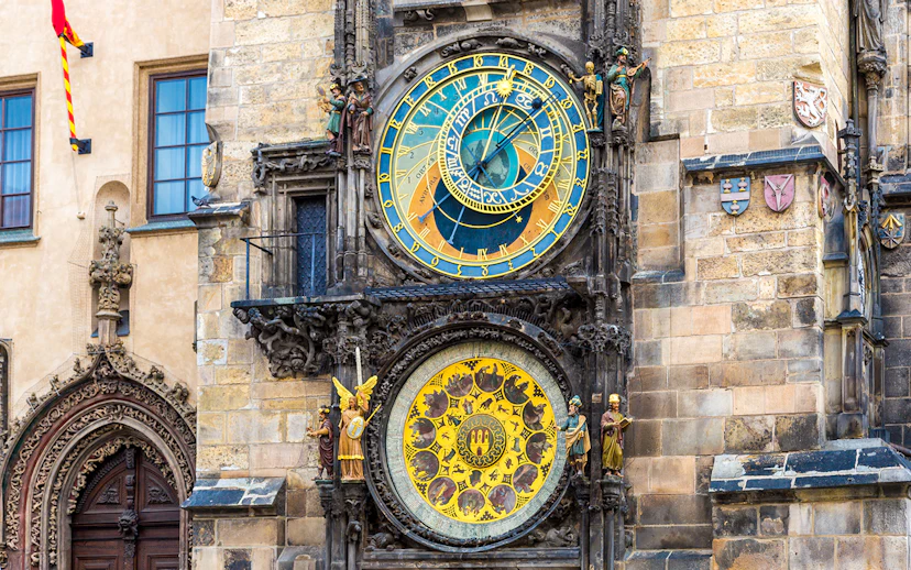 Astronomical Clock in Prague with intricate zodiac and time dials.