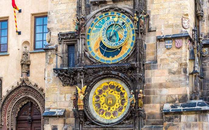 Astronomical Clock in Prague with intricate zodiac and time dials.