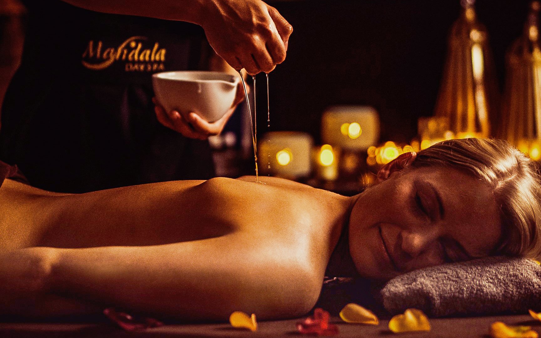 Massage therapy with oil at Mandala Day Spa, Budapest.