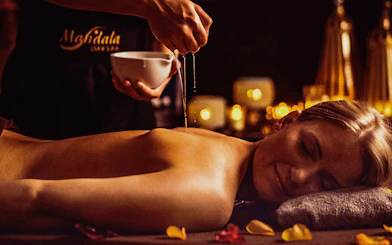Massage therapy with oil at Mandala Day Spa, Budapest.