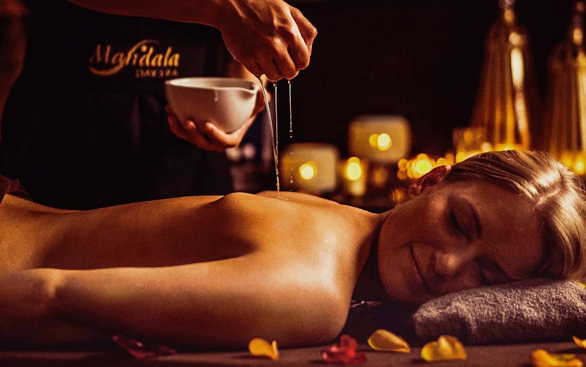 Massage therapy with oil at Mandala Day Spa, Budapest.