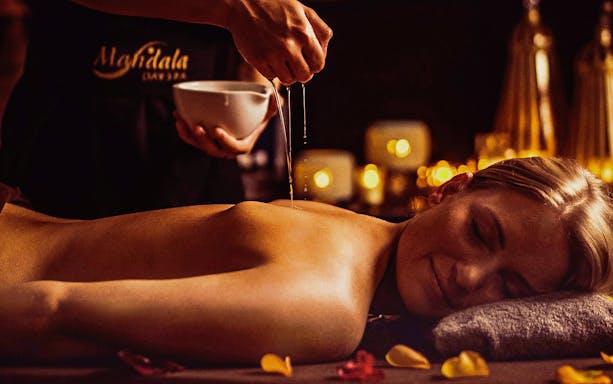 Massage therapy with oil at Mandala Day Spa, Budapest.
