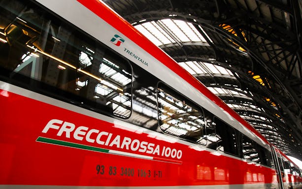 Frecciarossa 1000 train at an Italian station, part of 7-Day Italy Train Pass.