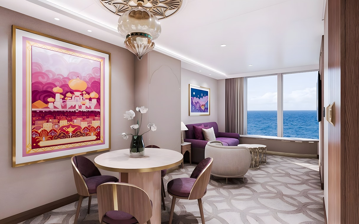 Concierge Family Oceanview Suite with seating area and ocean view on Disney Adventure Cruise.