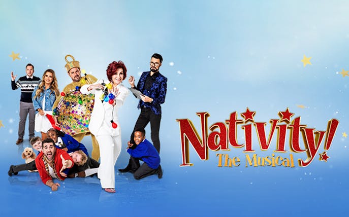 Cast of Nativity! The Musical posing with festive props and costumes.