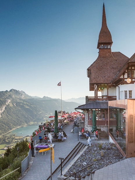 Funicular station at Harder Kulm with panoramic view of Swiss Alps and Lake Thun.