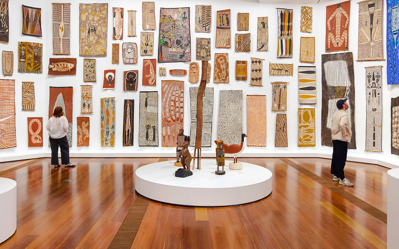 Visitors viewing Indigenous art at The Ian Potter Centre: NGV Australia.