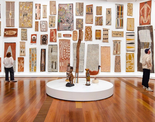 Visitors viewing Indigenous art at The Ian Potter Centre: NGV Australia.