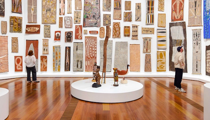 Visitors viewing Indigenous art at The Ian Potter Centre: NGV Australia.
