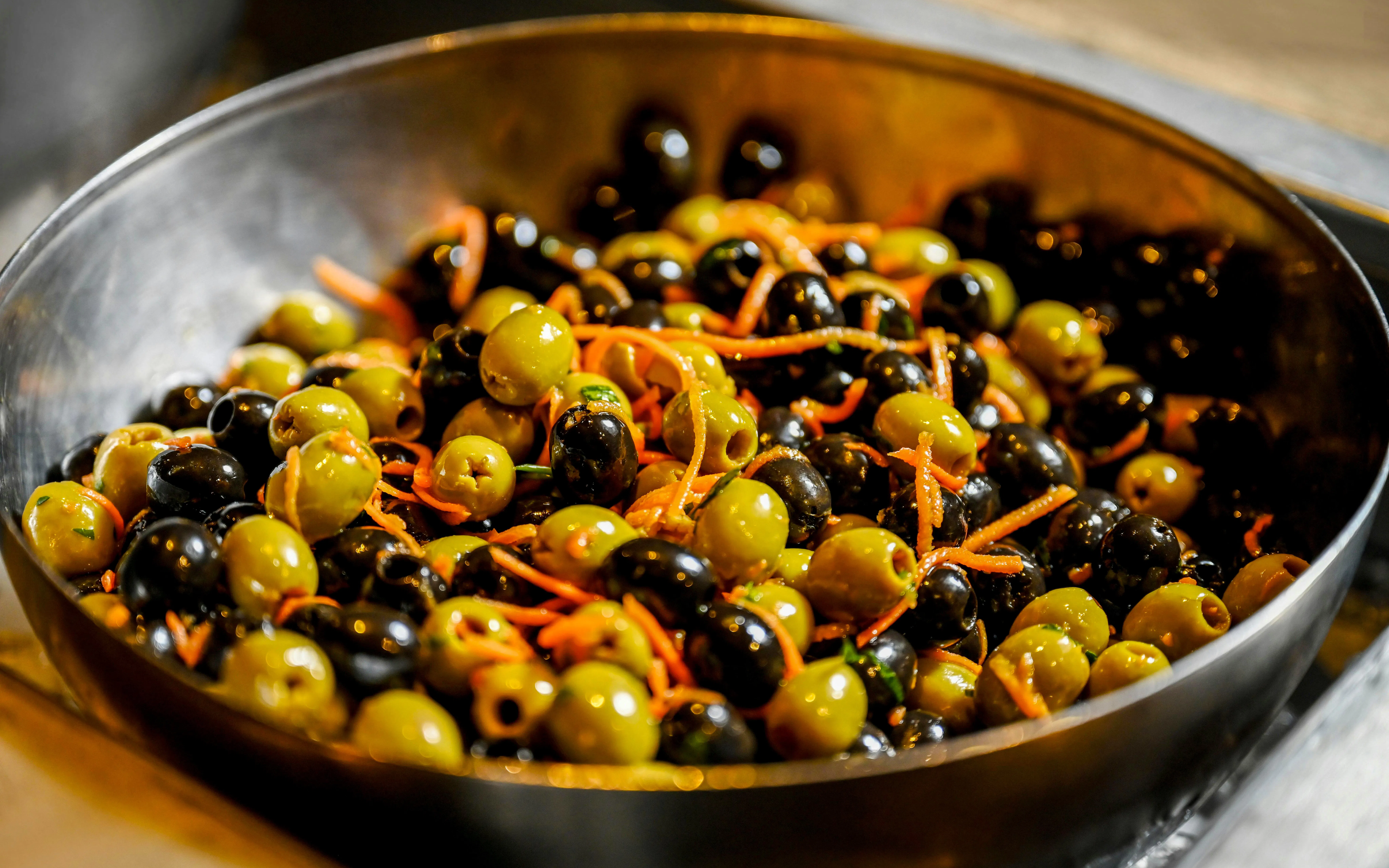Olives and carrots served during desert safari meal.