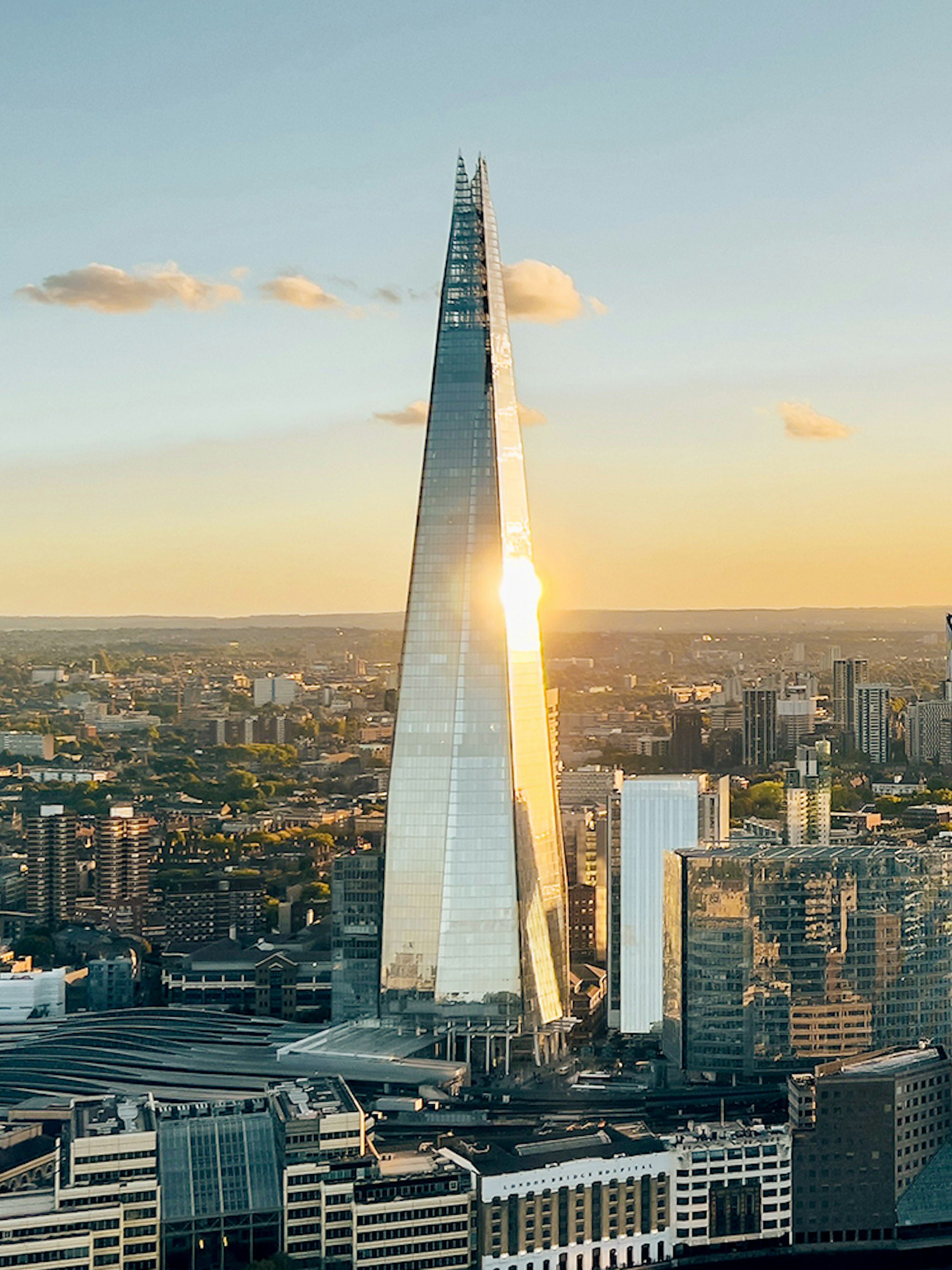 Aerial view of the Shard tower in central London at sunset.