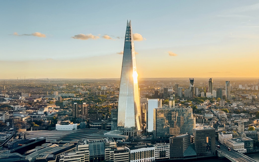 Aerial view of the Shard tower in central London at sunset.
