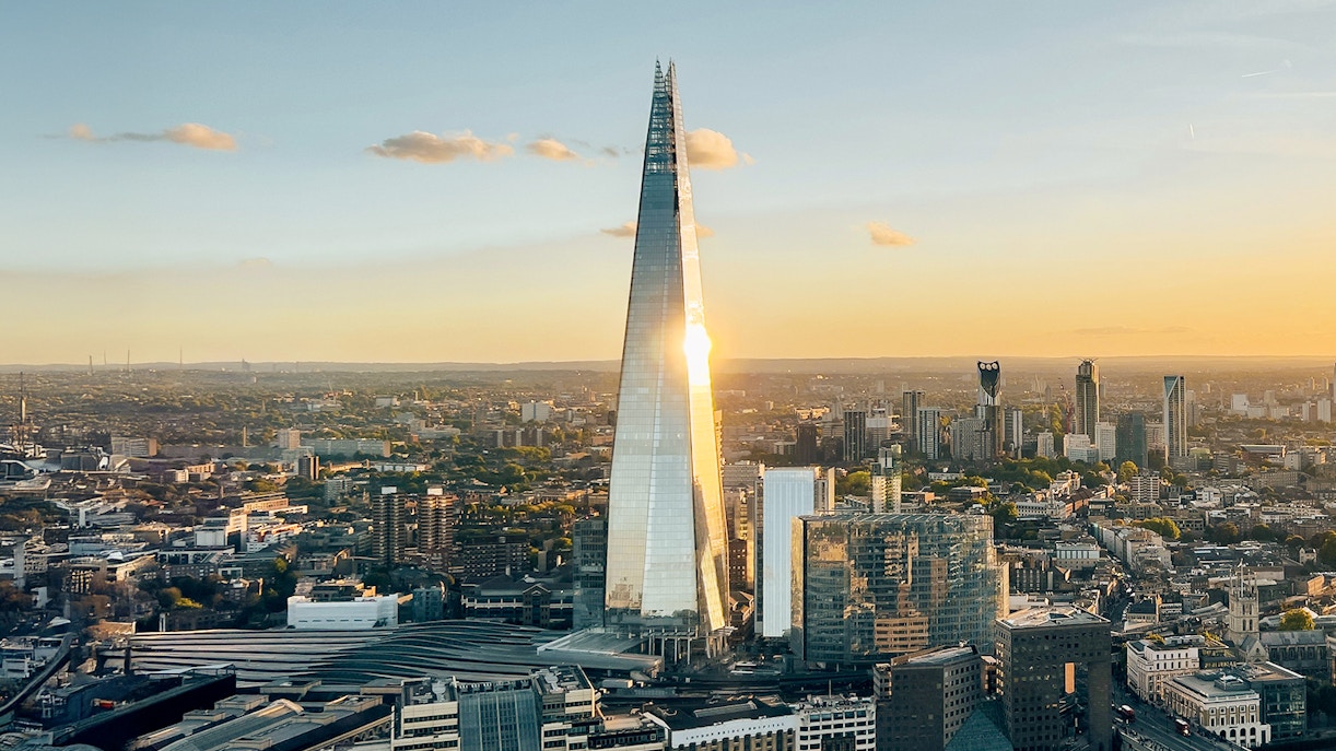 Aerial view of the Shard tower in central London with surrounding cityscape.