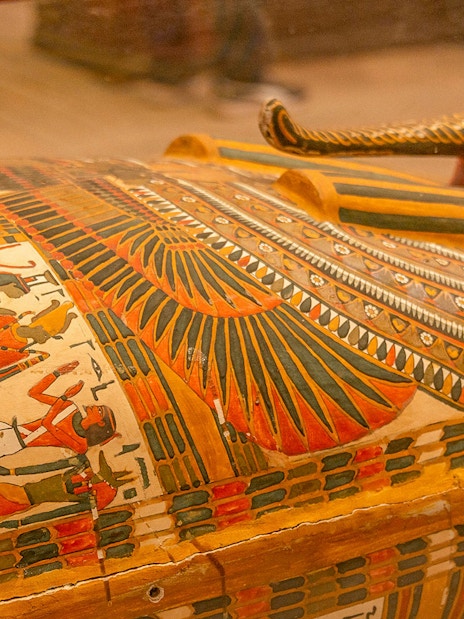 Sarcophagus with colorful hieroglyphics at the Egyptian Museum of Antiquities.