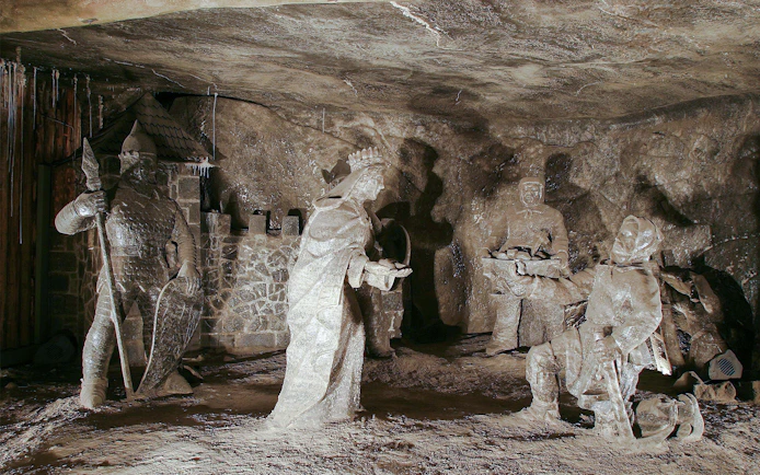Salt sculptures depicting historical figures in Wieliczka Salt Mine, Poland.