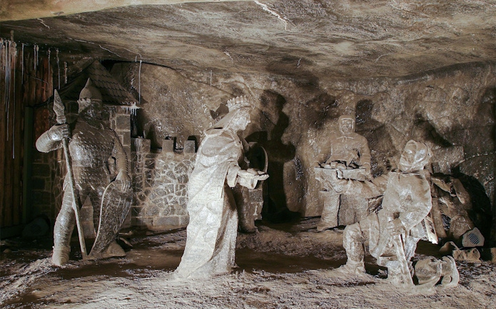 Salt sculptures depicting historical figures in Wieliczka Salt Mine, Poland.