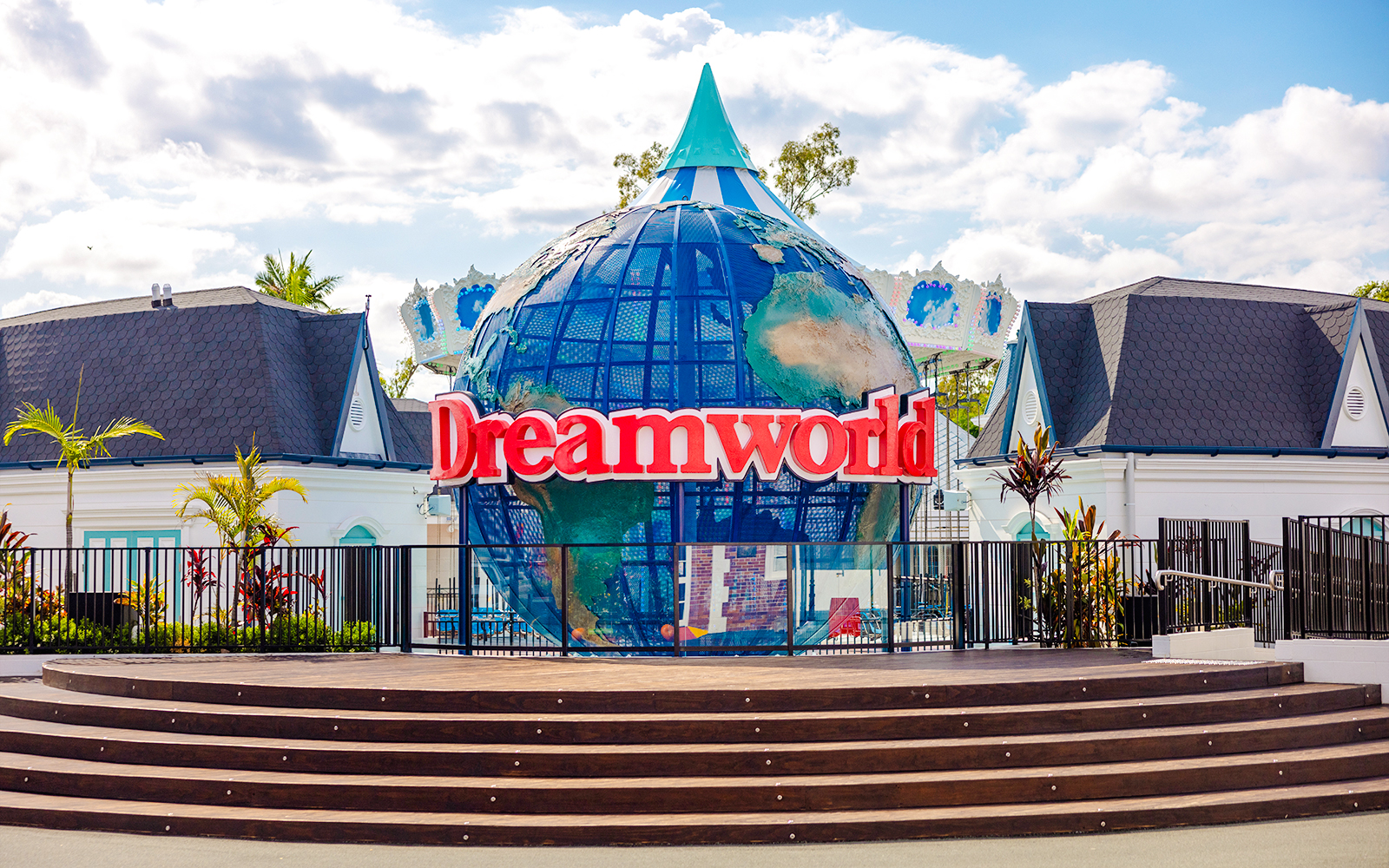 Dreamworld entrance with iconic globe sculpture, Gold Coast, Australia.
