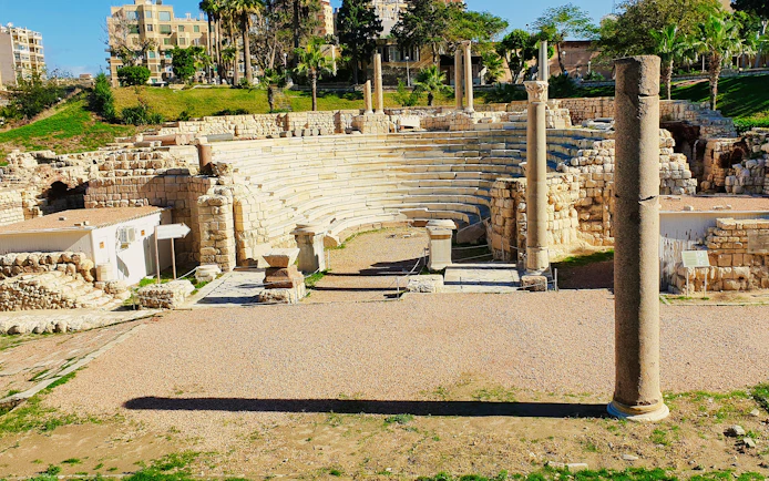 Ancient Roman Theatre ruins with stone seating and columns in Kom El-Deka, Alexandria.