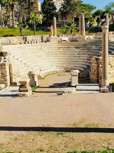 Ancient Roman Theatre ruins with stone seating and columns in Kom El-Deka, Alexandria.