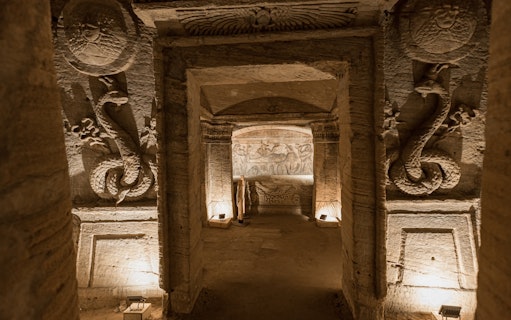 Ancient carvings inside the Catacombs of Kom el Shoqafa, Alexandria, Egypt.
