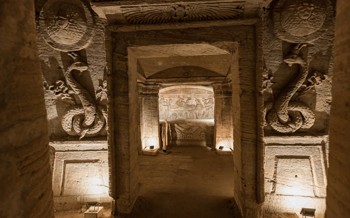 Ancient carvings inside the Catacombs of Kom el Shoqafa, Alexandria, Egypt.