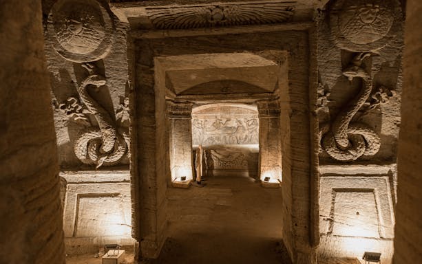 Ancient carvings inside the Catacombs of Kom el Shoqafa, Alexandria, Egypt.