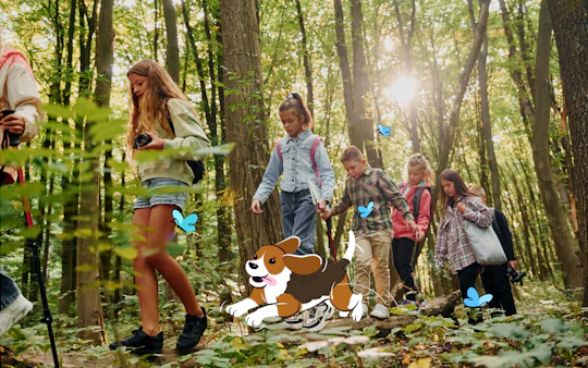 Group of children hiking through a sunlit forest trail with butterflies.