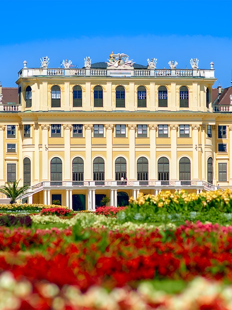 Schönbrunn Palace with vibrant gardens in Vienna, Austria.