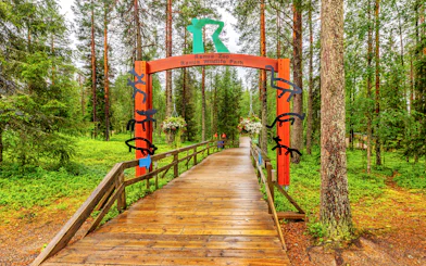 Entrance to Ranua Wildlife Park surrounded by forest, part of Rovaniemi zoo tour.