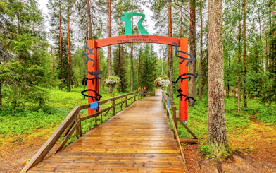Entrance to Ranua Wildlife Park surrounded by forest, part of Rovaniemi zoo tour.