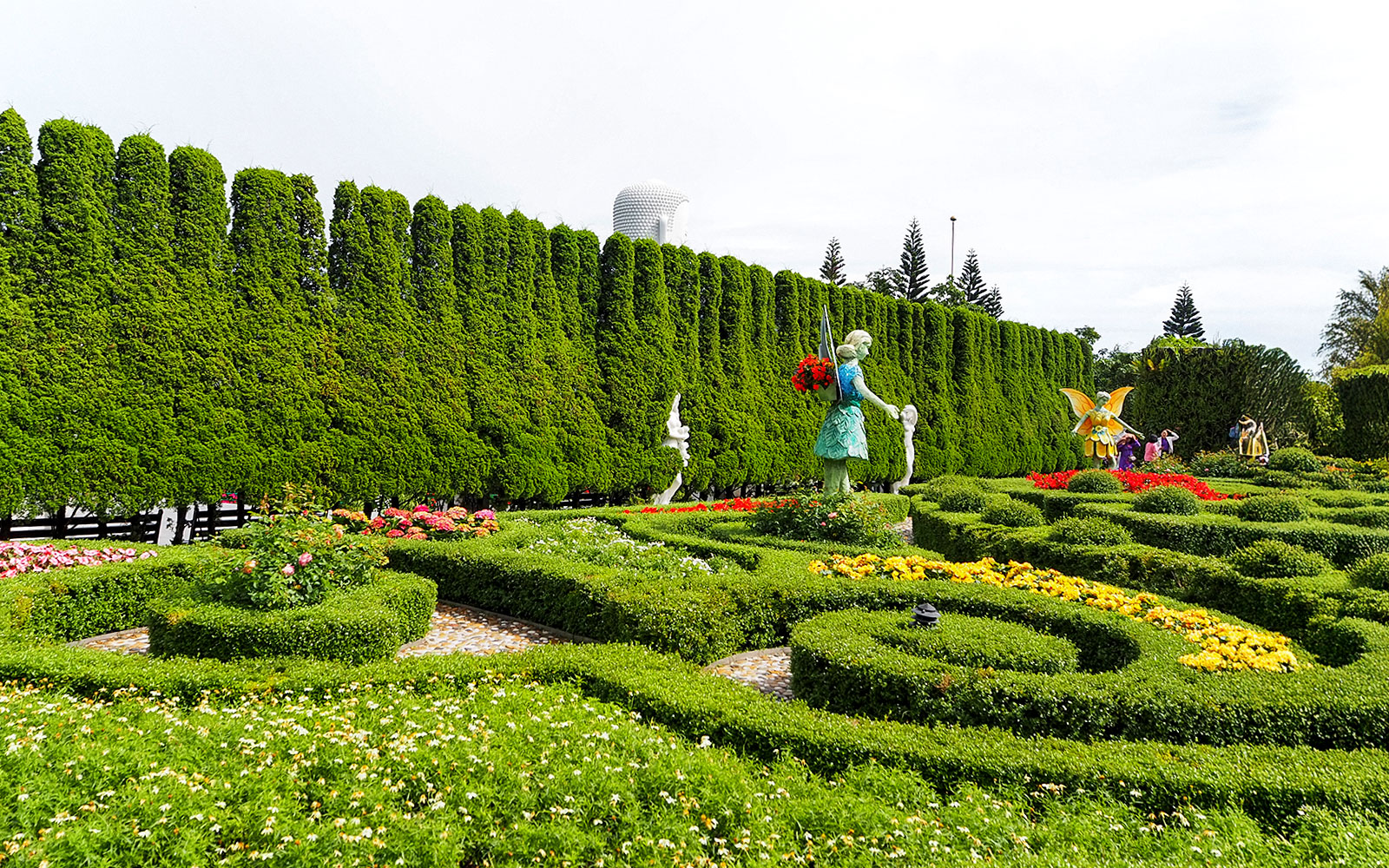 Flower garden with statues and hedges in Ba Na Hills, Da Nang, Vietnam.
