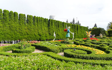Flower garden with statues and hedges in Ba Na Hills, Da Nang, Vietnam.