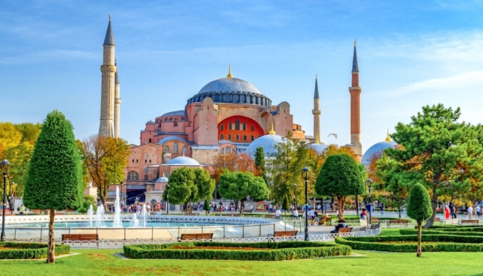 Hagia Sophia exterior with minarets and gardens in Istanbul.
