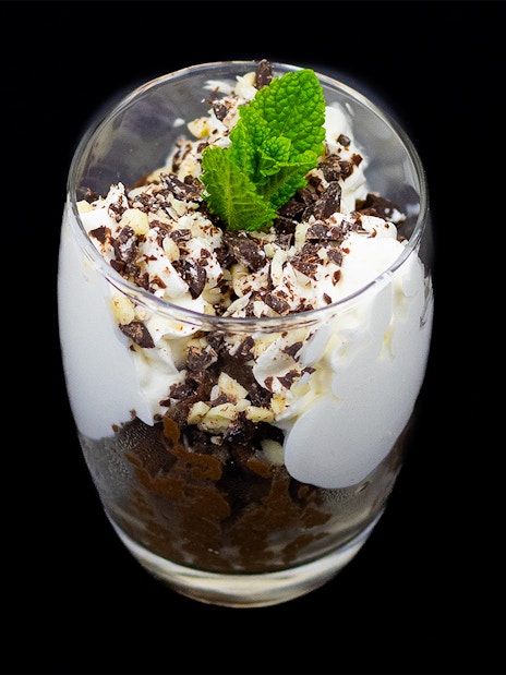 Dessert with whipped cream and chocolate shavings on Budapest Dinner Cruise.