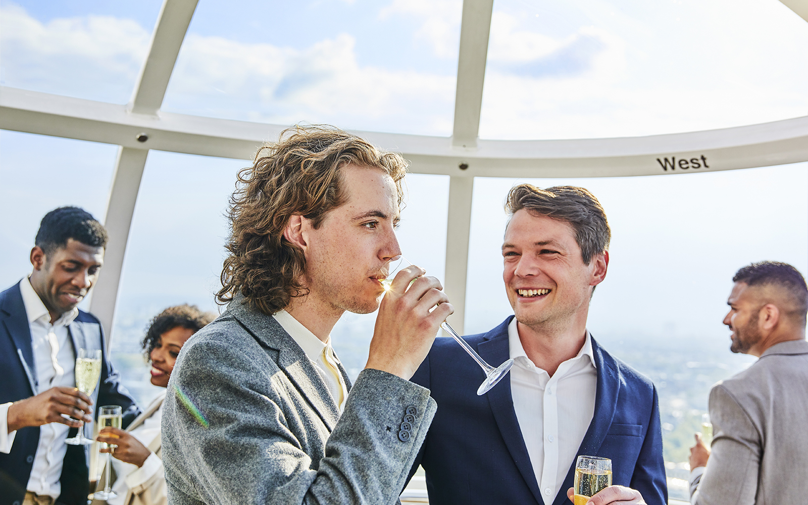 Guests enjoying champagne on the London Eye capsule.