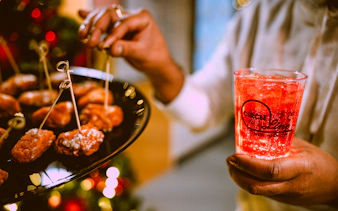 Appetizers and a festive drink on New Year’s Eve Cruise in NYC.