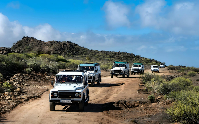 Jeep convoy on a dirt road during a Gran Canaria safari tour.