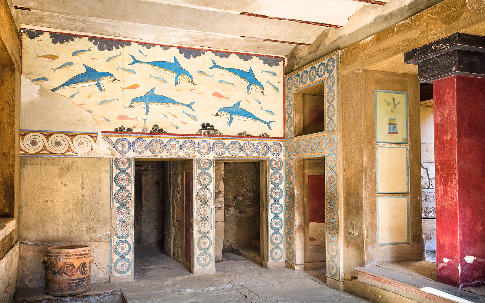 Knossos Palace fresco with dolphins and geometric patterns, Crete archaeological site.