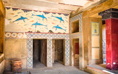 Knossos Palace fresco with dolphins and geometric patterns, Crete archaeological site.