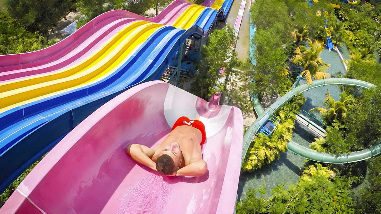 tourist enjoying ESCAPE Penang water slide
